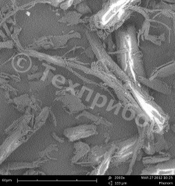 ФОТО.3. Электронно-микроскопическое изображение древесной муки,<br> полученной на комбинированной мельнице-нагревателе «С.А.М.П.О. 2012» с 50 пульсационными камерами<br> статора (увеличение 2000х, размерная шкала- 60 мкм)